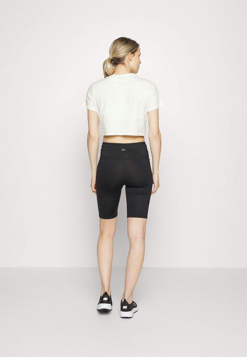 Calvin Klein Performance SEAMLESS SHORT - Leggings - black beauty/black -  Zalando.de