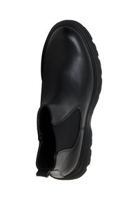 Bottine en cuir noir avec panneaux latéraux élastiques, bout arrondi et semelle épaisse en caoutchouc. Texture lisse avec des détails minimalistes.