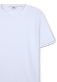T-shirt bianco in cotone con scollo rotondo e maniche corte. Presenta cuciture decorative beige lungo gli orli delle maniche. Taglia etichettata come L.