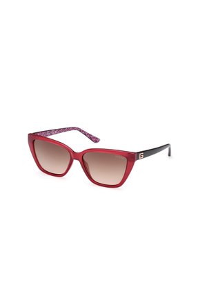 Red plastic frame sunglasses with a cat-eye shape, gradient brown lenses, and patterned purple accent on the arms. Brand logo on side.