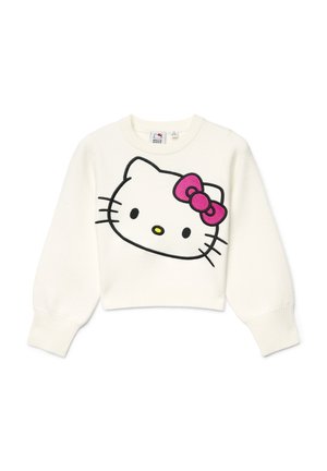 Pull court de couleur crème avec un design Hello Kitty noir et rose, des poignets côtelés et un col rond. Matière en tricot douce.