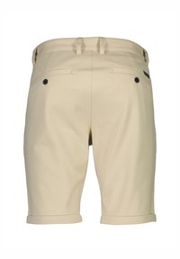 Beige shorts made of cotton blend fabric, featuring a smooth texture, rolled hem, and two back pockets with black buttons.