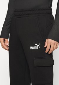 Puma Jogginghose - black
