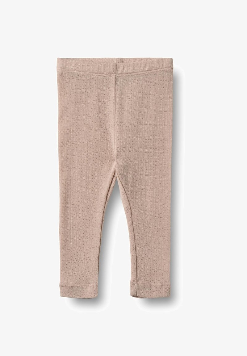 Leggings roses clairs en tissu texturé avec une taille élastique, présentant un design ajusté et une coupe à la cheville.