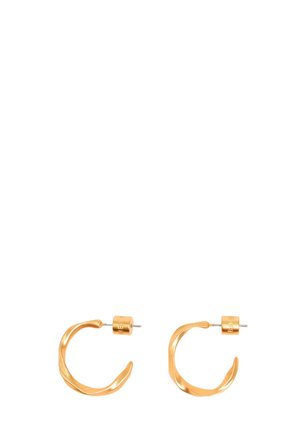 Gold-toned metal hoop earrings with a twisted, wavy design and a cylindrical post closure, featuring a smooth, reflective surface.