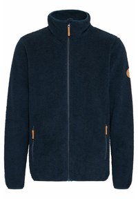 Marineblaue Fleecejacke mit hohem Kragen, Frontreißverschluss und Lederakzenten an den Taschen. Weicher, texturierter Stoff mit lockerer Passform.