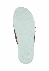 Rubber sole with a textured white surface, featuring a zigzag pattern. Main body resembles brown fabric, with a reinforced back.