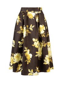 Gonna floreale marrone con fiori gialli e bianchi, realizzata in tessuto morbido, con un design plissettato e un taglio a lunghezza media.