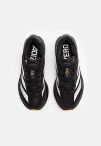 adidas Performance ADIZERO   - Laufschuh Straße - core black/zero metallic/spark