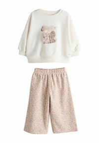 Ei valittu, cream bunny