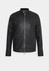 Black leather jacket with a stand collar and zipper front. Features a smooth texture, tailored fit, and side pockets. Classic design.