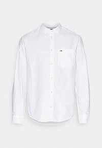 Seleccionado, white