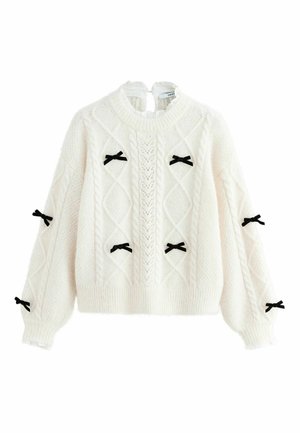 Weißer Strickpullover mit einem strukturierten Diamantmuster, versehen mit schwarzen Schleifenakzenten an den Ärmeln sowie einem gerippten Kragen und Saum.