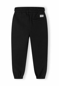 Zwarte sweatpants van zachte stof, met een elastische tailleband, smalle boorden en een achterzak met een klein labelaccent.