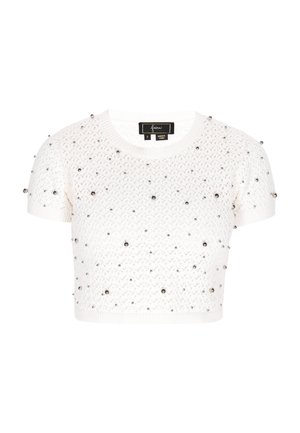 Maglione bianco corto con maniche corte, caratterizzato da un motivo lavorato a maglia e decorazioni rotonde in argento. Collo e orlo a coste.