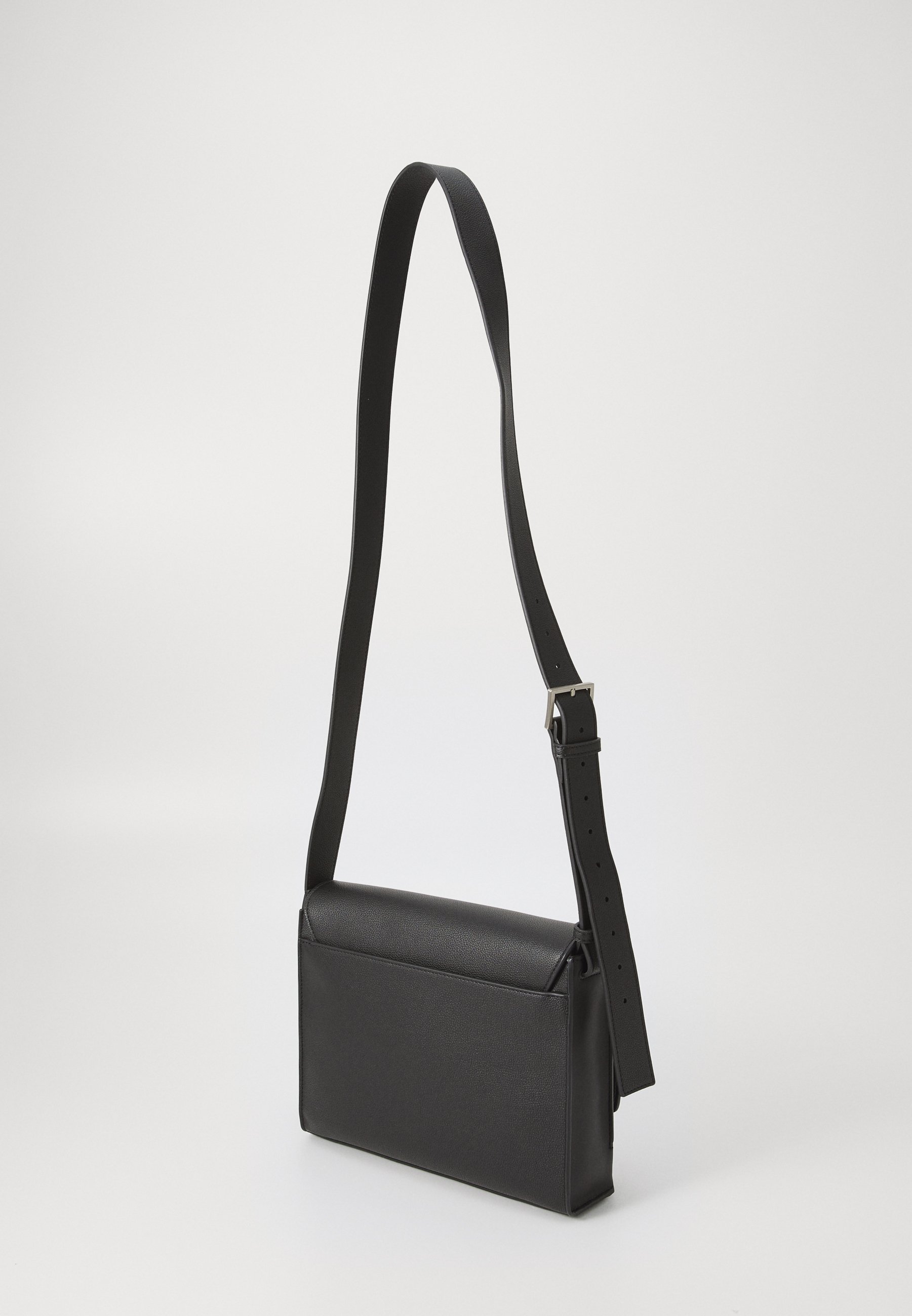 Calvin Klein MICRO PEBBLE MESSENGER - Cross body bag - black