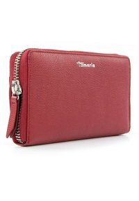 Red leather wallet with textured surface, silver hardware, zip closure, and a small wrist strap. Logo embossed on the front.