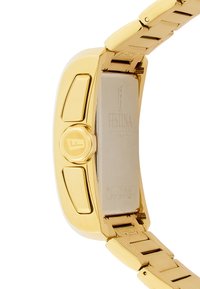 Orologio in metallo color oro caratterizzato da una cassa lucida, bracciale in acciaio inossidabile e marchio sul retro. Corona circolare con logo in rilievo.