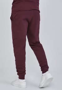 SIKSILK Pantaloni sportivi - burgundy