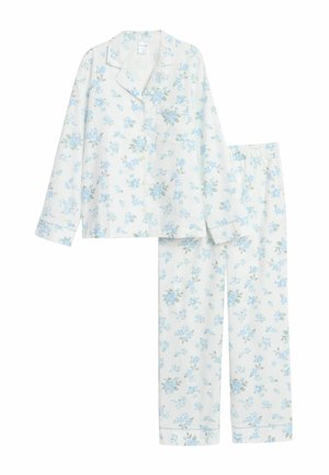 Leichtes Baumwoll-Pyjama-Set mit Oberteil zum Knöpfen und Tasche sowie Hosen mit elastischem Bund, verziert mit einem blauen Blumenmuster auf weißem Hintergrund.