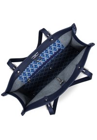 Sac à main en cuir bleu marine avec doublure à motif géométrique, intérieur spacieux, poche zippée et deux anses robustes.