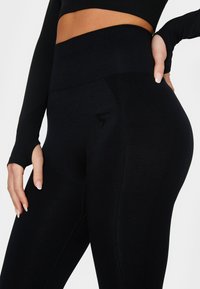 SQUATPROOF PURPOUSE - Leggings - black