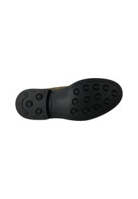 Scarpa in suede marrone con suola in gomma nera caratterizzata da modelli di trazione circolari e una finitura liscia. Il design enfatizza comfort e stabilità.
