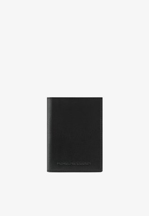 Portefeuille bi-fold en cuir noir avec logo "Porsche Design" subtilement embossé en bas au centre sur fond blanc.