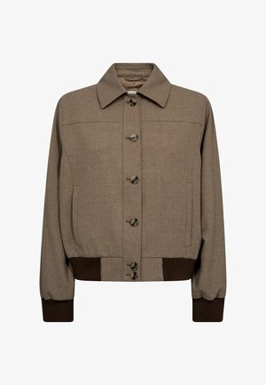 Barna gyapjúkeverék dzseki galléros nyakkivágással, gombos elülső résszel, oldalzsebekkel és bordázott mandzsettákkal. Texturált anyagból készült, kontrasztos barna szegéllyel.