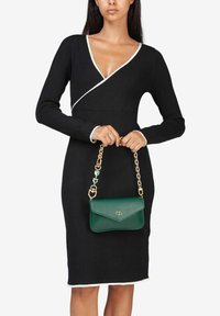 Miriade Clutch - verde