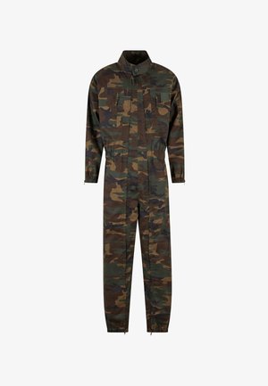 Kamufliažo rašto ilgos rankovės šokiai su priekiniais užtrauktukais, keliais užtrauktukais uždaromais krūtinės kišenėmis, elastingais rankogaliais ir aukštu apykakle.