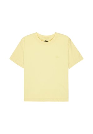 T-shirt à manches courtes jaune pâle avec col ras du cou et logo brodé subtil sur la poitrine gauche, posé à plat sur fond blanc.