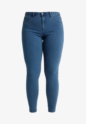 High-waisted, slim-fit jeans in medium blue denim. Classic five-pocket design with metal button and zipper closure. Smooth texture.