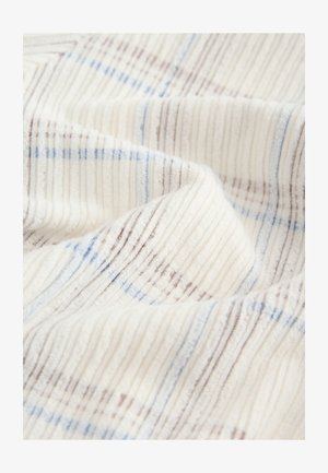 Tkanina o fakturze w kremowym kolorze z pionowymi paskami w odcieniach niebieskiego i brązu. Miękka i prążkowana powierzchnia o delikatnym połysku.