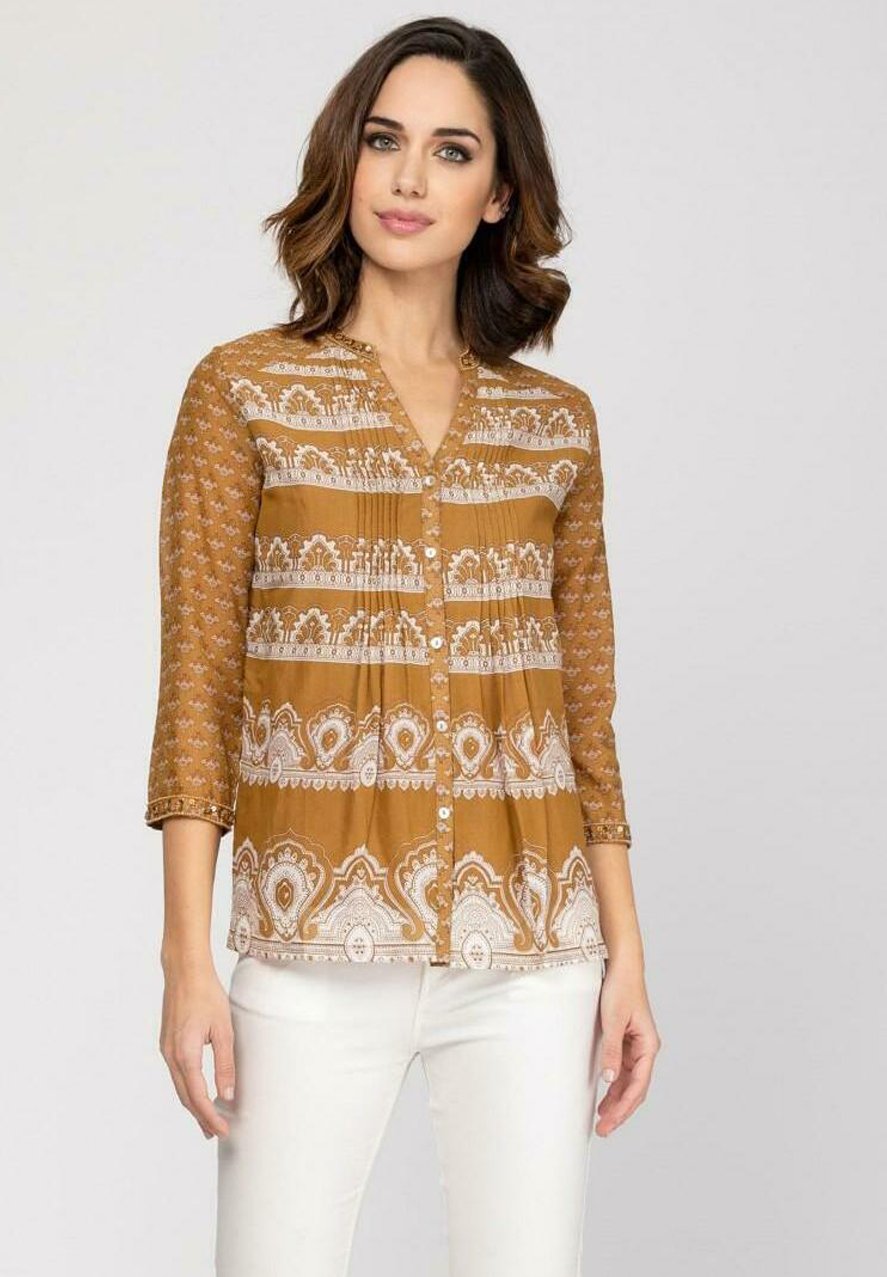 Blusas y tops de fiesta para ser la invitada perfecta