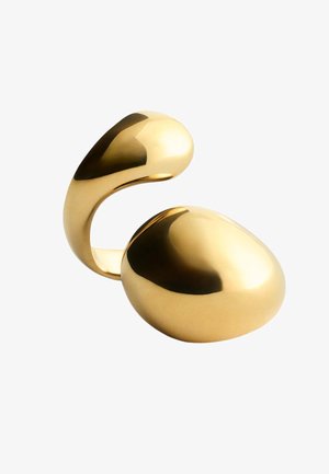 Anneau en or lisse et poli avec un design asymétrique à extrémités ouvertes, présentant deux formes bulbées à chaque bout.