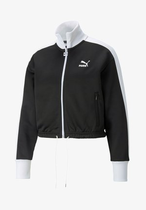 Black cropped jacket with white accents, ribbed collar, zippered front, side pockets, and logo detail. Made from textured fabric.