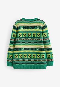Grüner gestrickter Pullover mit einem Minecraft-Muster, das Creeper-Gesichter, geometrische Designs und Text zeigt. Gerippte Bündchen und Ausschnitt.