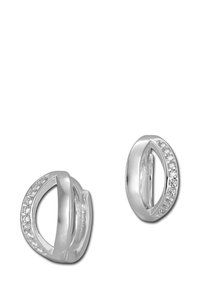 Boucles d'oreilles en argent présentant une forme ovale symétrique avec une finition polie et une rangée de petites pierres transparentes le long d'un côté.