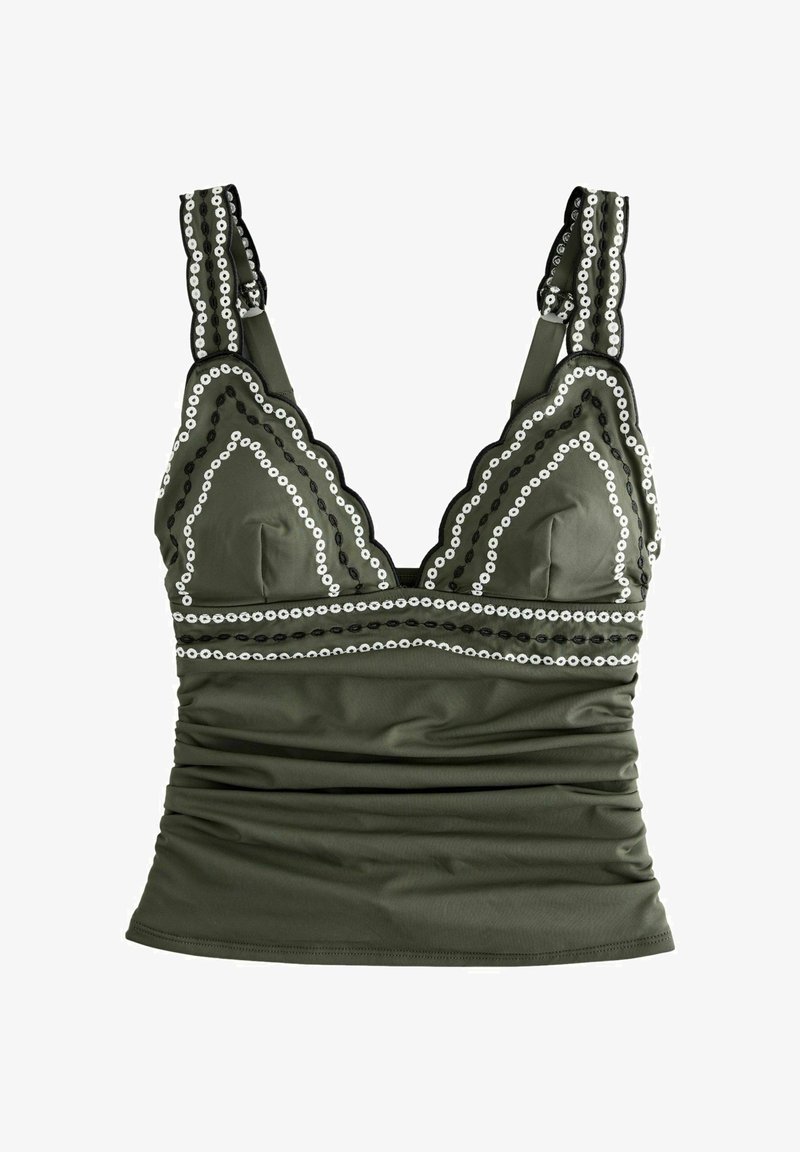 Olivengrøn tanktop med bølget kant og hvide og sorte cirkulære broderidetaljer på stropper og brystområde.