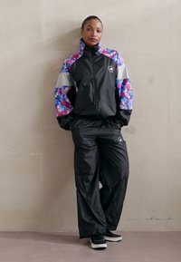 adidas by Stella McCartney PANT - Pantalones deportivos - carbon