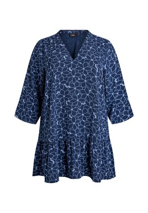 Granatowa tunika z dekoltem w kształcie litery V, rękawami 3/4 i falbaną u dołu. Posiada kwiatowy wzór w jasnoniebieskim kolorze na miękkim materiale.