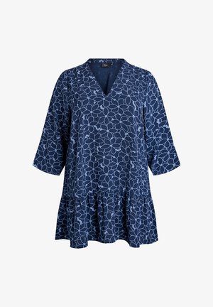 Granatowa tunika z dekoltem w kształcie litery V, rękawami 3/4 i falbaną u dołu. Posiada kwiatowy wzór w jasnoniebieskim kolorze na miękkim materiale.