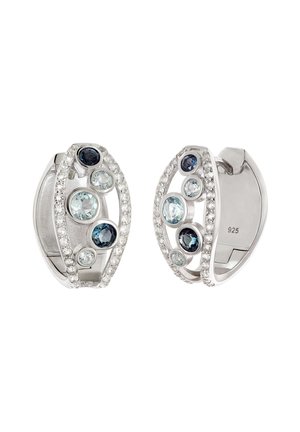 Pair of silver hoop earrings with blue and clear gemstones, bordered by rows of small white stones, marked with 925 for sterling silver.