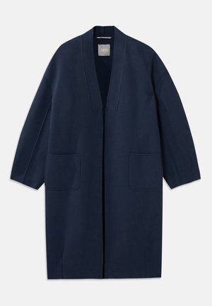 Navy blue long coat with a loose fit, wide sleeves, V-neckline, and two front pockets. Made of a smooth, textured fabric.