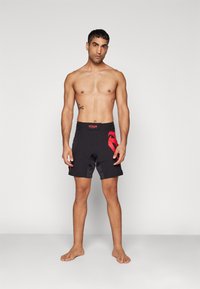 Venum RAPID FIGHTSHORTS - Sport rövidnadrágok - black/red