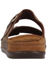 Sandali in suede marrone con due cinturini regolabili e una soletta testurizzata. Comprendono una suola in gomma marrone con dettagli di cucitura.
