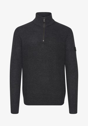 Tumehall villane sviiter, millel on kõrge krae ja veerand-zipp. Omab ribatakistusi varrukates ja ääres, lisaks väike dekoratiivne plaastrikene varrukal.