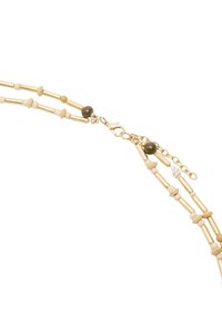 Naszyjnik koralikowy z naprzemiennie ułożonymi wydłużonymi złotymi i drewnianymi koralikami, z ciemnym akcentującym koralikiem oraz zapięciem typu homar.