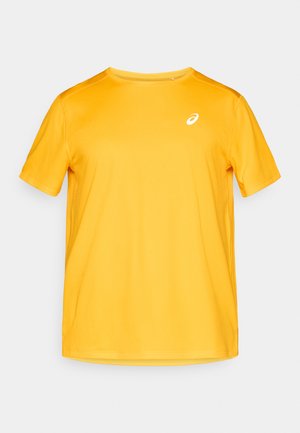 Κίτρινο T-shirt με κοντά μανίκια από απαλό ύφασμα, με λαιμόκοψη στρογγυλή και μικρό λευκό λογότυπο στο αριστερό στήθος.